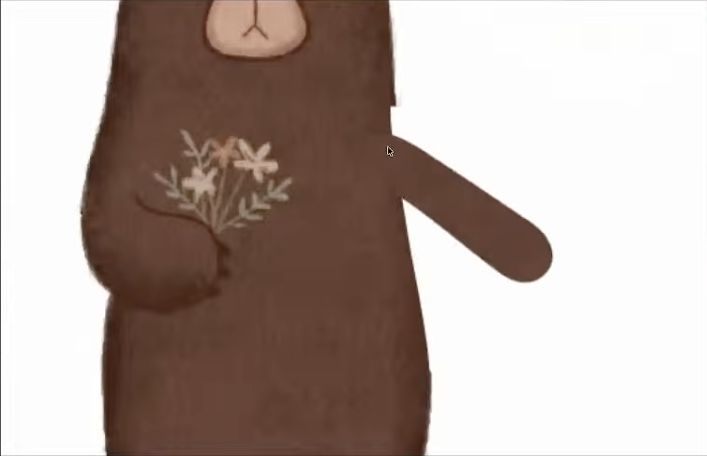 腕が下がる側のコマ。くまの体に花の模様が残っている